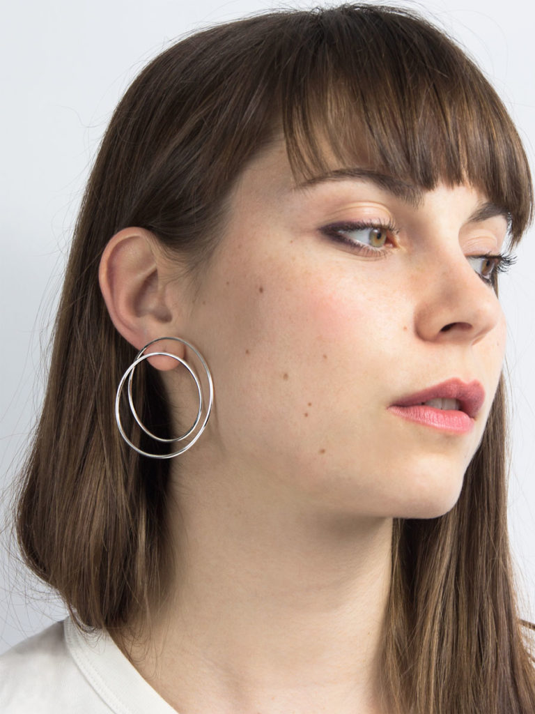 Twist earrings silver on the ear